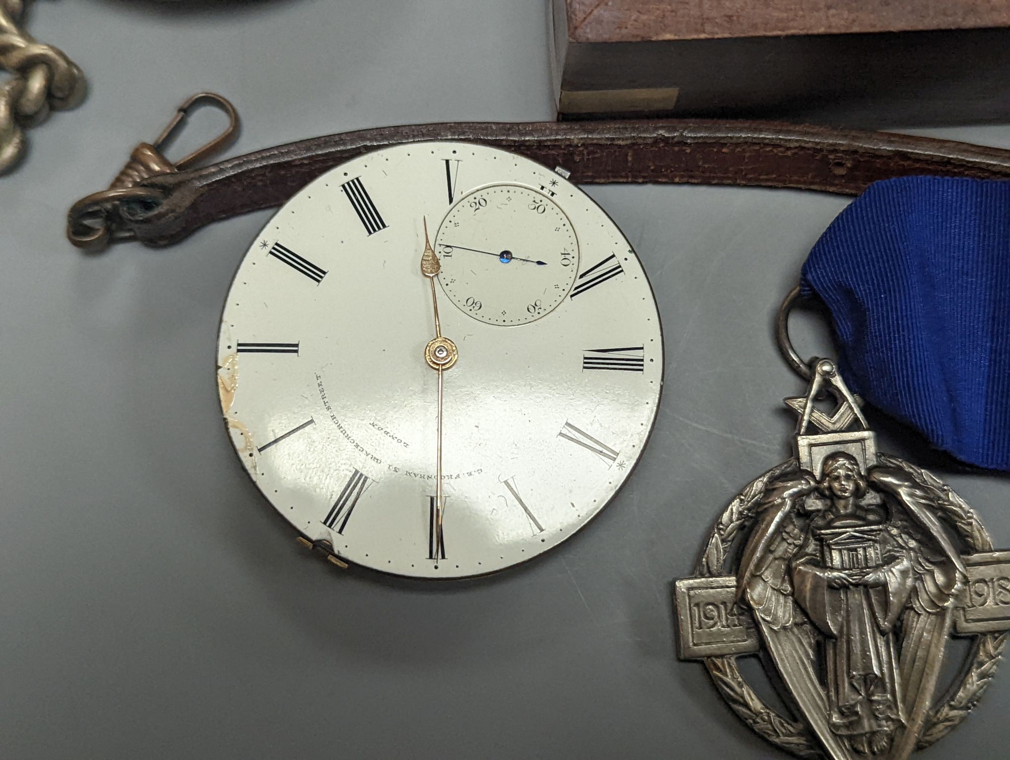 Two assorted pocket watches including sterling, a pocket watch movement by G.E. Frodsham, a masonic jewel and a cased brass Stanley compass.